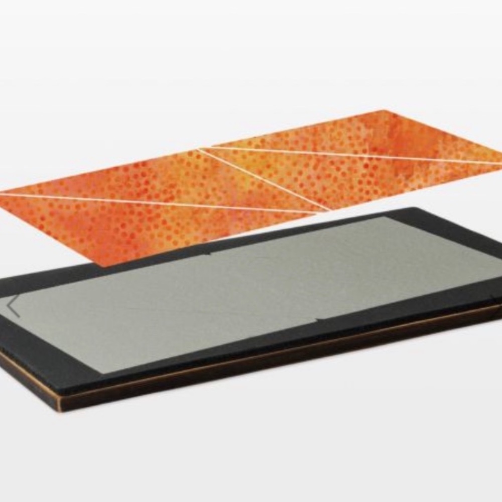 Accuquilt Studio half of a square triangle, 10 inch finished , New in box